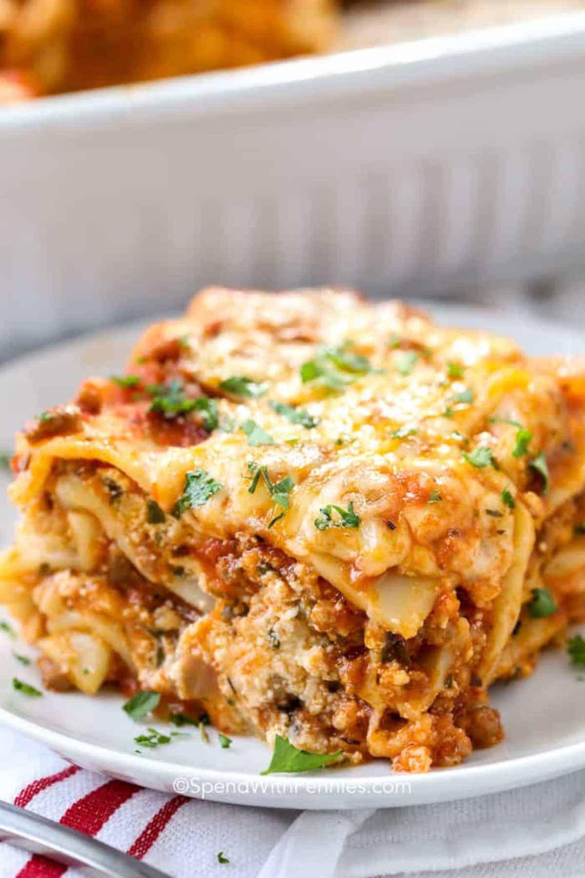 Golden homemade lasagna with bubbling cheese and perfectly layered pasta, meat sauce, and ricotta